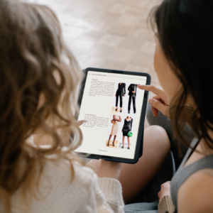 Two young women business professionals choosing outfits for their social outing